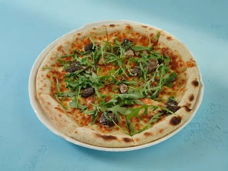 truffle mushroom pizza with arugula
